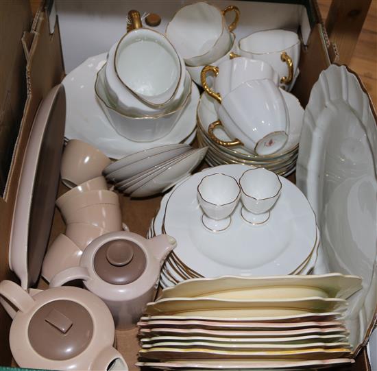 A Royal Crown Derby tea and dinner service, various dessert plates and a Poole coffee set